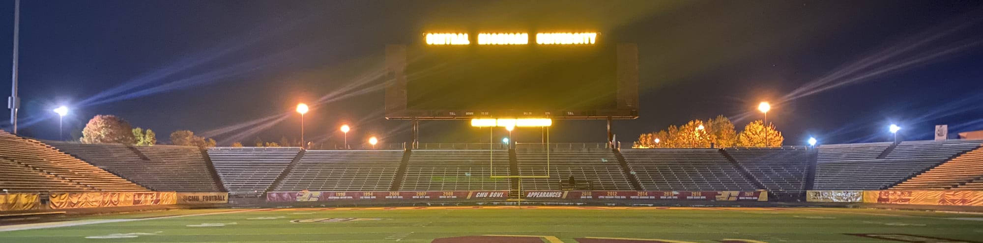 empty football stadium at night under the lights Dallas
