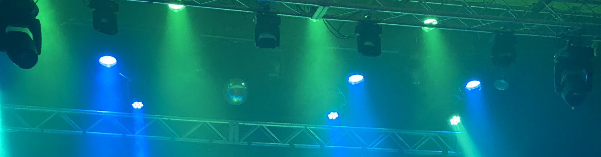 blue and green theater stage lights Dallas